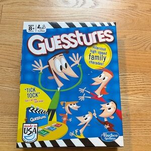 Hasbro Guesstures Game - Blue and Yellow Box